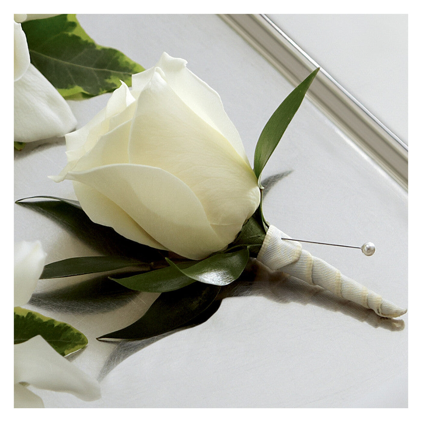 White Rose Boutonniere flower arrangement