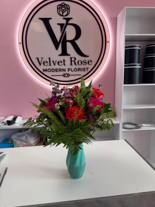 Mixed rose vase arrangement at Velvet Rose